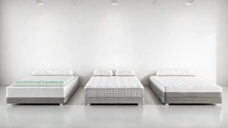 Ilustração conceitual mostrando diferentes tipos de colchões em seção transversal em ambiente minimalista